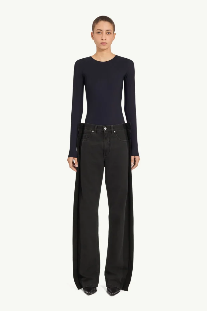 Jeans nero con pannelli laterali